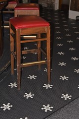 Red bar stools on carpet