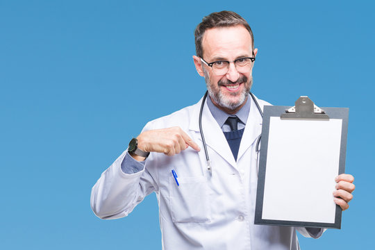Middle age senior hoary doctor man holding clipboard isolated background with surprise face pointing finger to himself - Powered by Adobe