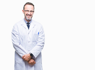 Middle age senior hoary professional man wearing white coat over isolated background with a happy and cool smile on face. Lucky person.