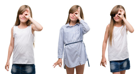 Collage of blonde girl kid over isolated background with happy face smiling doing ok sign with hand on eye looking through fingers