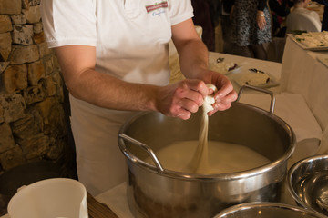 Close Up of the Hand Made Preparation of Italian Traditional Cheese called Mozzarella