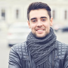 Closeup portrait of beautiful handsome man 