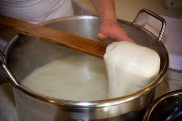 Close Up of the Hand Made Preparation of Italian Traditional Cheese called Mozzarella