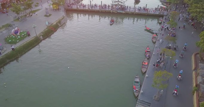 Aerial view of Hoi An old town or Hoian ancient town. Royalty high-quality free stock video footage top view of Hoai river and boat traffic Hoi An. Hoian is one of the most popular destination  travel