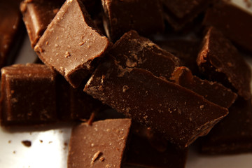 Chocolate background / Chocolate is a usually sweet, brown food preparation of roasted and ground cacao seeds