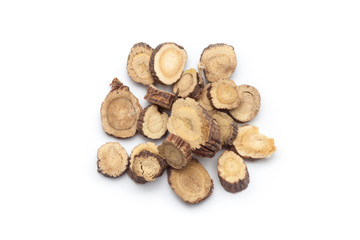 Sliced ​​of Licorice roots on white background, Chinese herbal medicine.