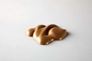 Shades Of Foundation On White Background. Makeup Product Texture.