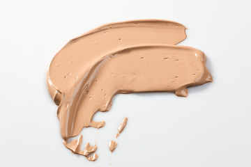 Shades Of Foundation On White Background. Makeup Product Texture.