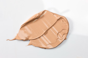 Shades Of Foundation On White Background. Makeup Product Texture.