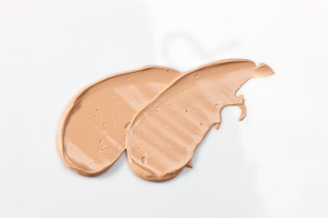 Shades Of Foundation On White Background. Makeup Product Texture.