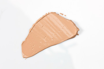 Shades Of Foundation On White Background. Makeup Product Texture.