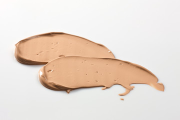 Shades Of Foundation On White Background. Makeup Product Texture.