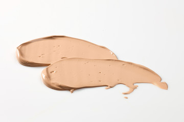Shades Of Foundation On White Background. Makeup Product Texture.