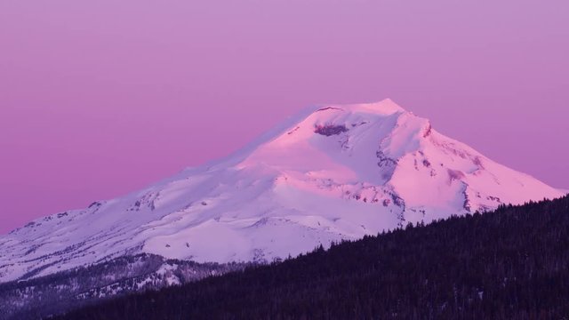 Oregon circa-2018. Aerial view of South Sister Mountain at sunrise. Shot from helicopter with Cineflex gimbal and RED Epic-W camera.