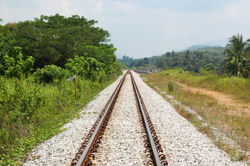 Fototapeta na wymiar Train Tracks Leading to the Horizon