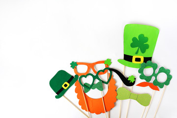 Festive masks for a St. Patrick's Day on a white background.