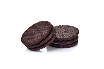 Chocolate cookies with cream filling isolated on white background