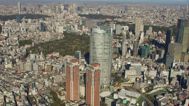 Tokyo, Japan circa-2018.  Aerial view of Roppongi Hills Building.  Shot from helicopter with RED camera.