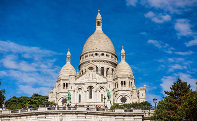 Fototapeta na wymiar Sacre Coeur Cathedral on Montmartre Hill in Paris, France