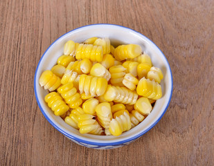 Sweet corn on a wooden background