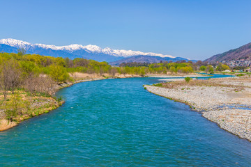Fototapeta premium 高瀬川と北アルプス