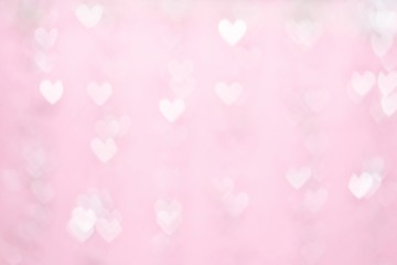 Bokeh background, pink heart shape. Valentines Day
