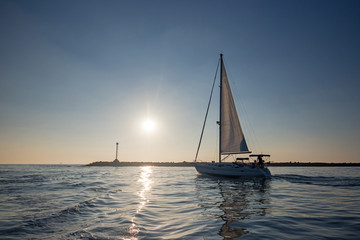 Sailboat leaving Channel Islands harbor in Oxnard California United States