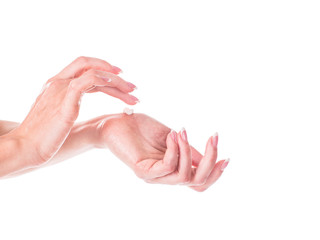 Female hands and moisturizing cream on white background. Skin care concept