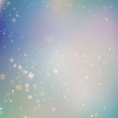 Background of soft delicate blue and purple pastel colored glittering bokeh light reflections. EPS 10