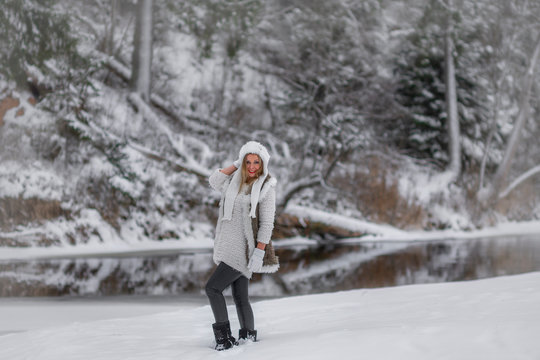 Winter photos of beautiful blue-eyed girl .