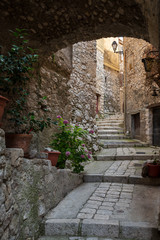 Fototapeta na wymiar The stunning narrow cobblestone streets of the beautiful hilltop village of Peillon in the Alpes-Maritime department of southeastern France