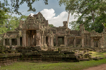 Front of Preah Khan framed by trees