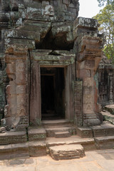 Fototapeta na wymiar Ruined stone doorway at Ta Som temple