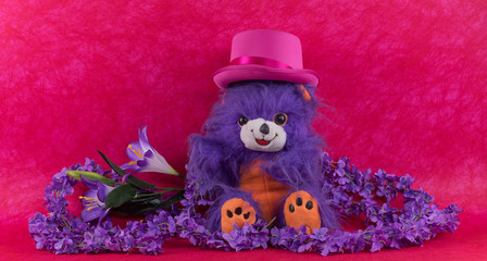 cute fluffy soft toy on a red background for valentines day