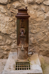 Old fire hydrant in Peillon, southeastern France