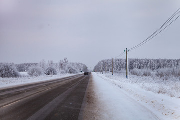 Country road after a snowfall in winter.