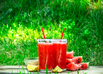 Red smoothie with watermelon and lemon.