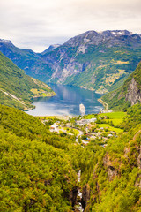 Obraz na płótnie Canvas Fjord Geirangerfjord with ferry boat, Norway.