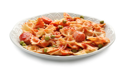 Plate with delicious pasta and sausage on white background