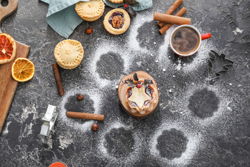Tasty mince pies on grunge table © Pixel-Shot