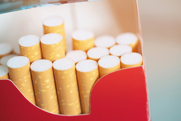 peel it off Cigarette pack prepare smoking a cigarette. Packing line up. photo filters Natural light.