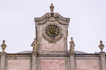 18th century architecture. Clock tower with sculptures
