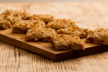 homemade apple pie on wooden background close up with copy space