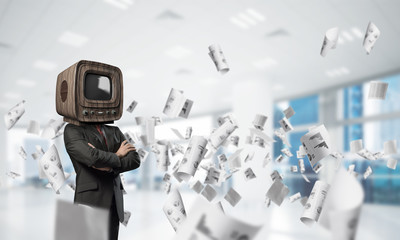 Businessman with old TV instead of head.