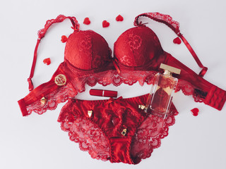 Red women underwear with lace isolated on white background. red bra and pantie.Copy space. Beauty,...