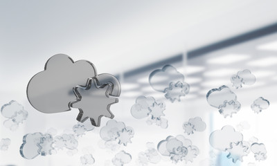 Cloud computing concept with glass symbol shown in air. Mixed media
