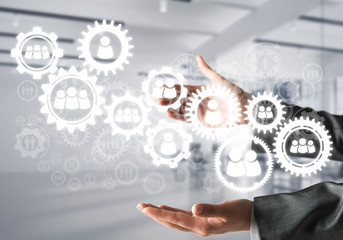 Cogwheels and gears mechanism as social communication concept