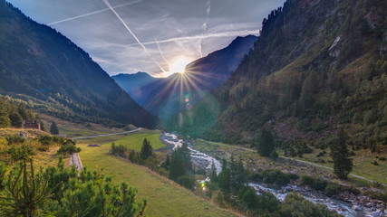 Sunrise in the Alps timelapse with impressive light and clouds. Tyrol, Austria.
