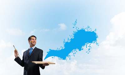 Inspiration of young creative businessman