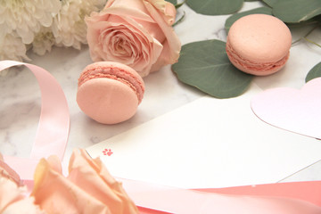 Composition for Valentine's day, macaroons, rose, eucalyptus, pink envelope
